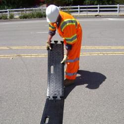 Three (3) TrafFix Alert Rumble Strips cover a standard width lane